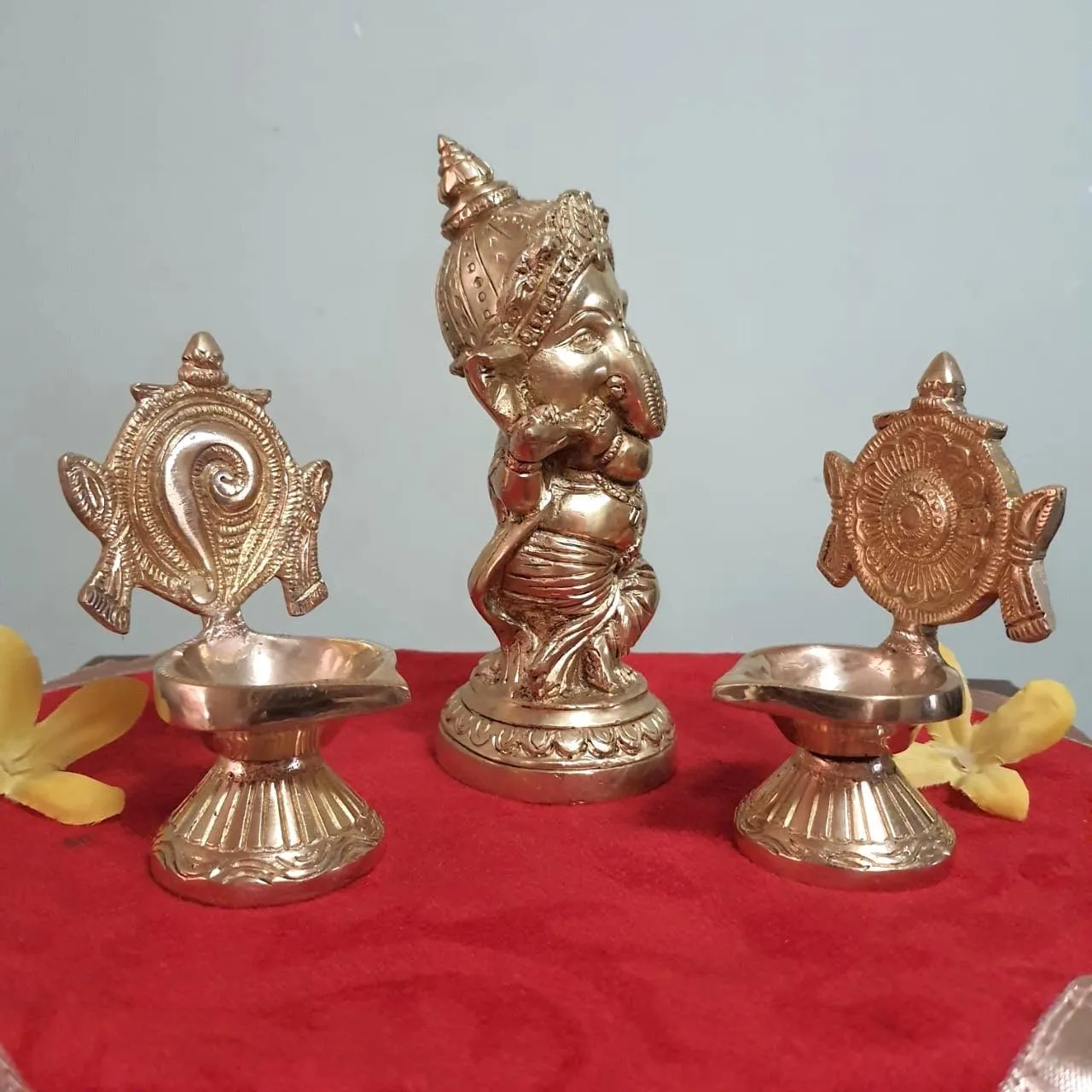 Flute Ganesh Brass Idol & Shanku and Chakra Diya Set