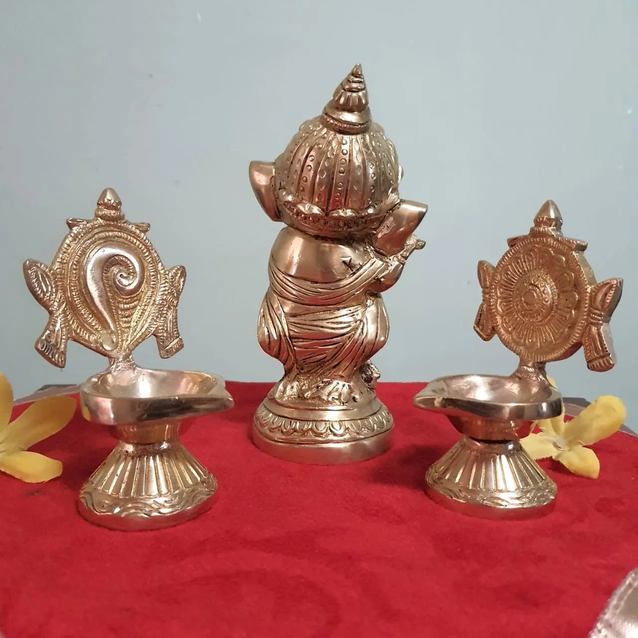 Flute Ganesh Brass Idol & Shanku and Chakra Diya Set