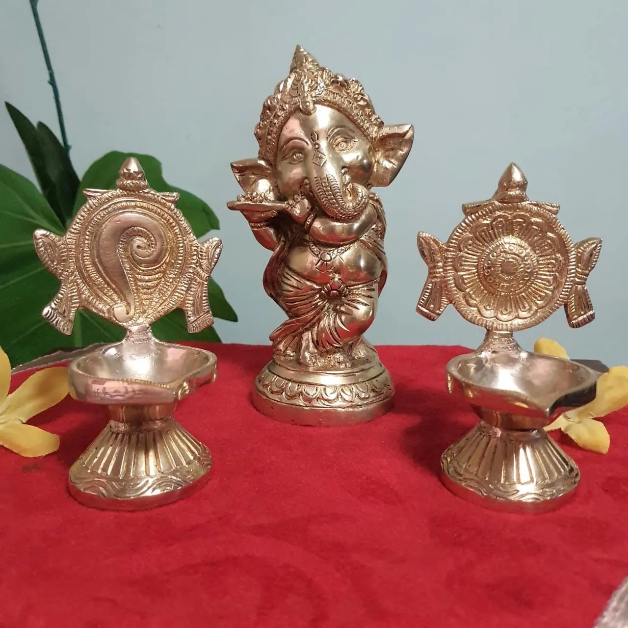 Flute Ganesh Brass Idol & Shanku and Chakra Diya Set